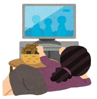 A woman eating rice crackers while relaxing