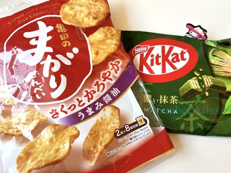 Matcha KitKat and Magari Senbei (Japanese rice crackers) packaging. With My Melody in the background.