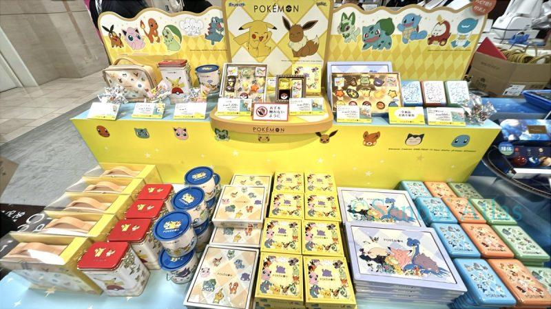 An exhibition of Pokémon chocolates (ポケモンチョコ) at the Amour du Chocolat (アムール・デュ・ショコラ) Valentine's Day event (バレンタイン催事) at Shinjuku Takashimaya (新宿高島屋). The main theme is Pikachu's yellow, creating a bright and lively atmosphere."