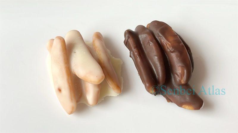 Kaki-no-Tane (柿の種) coated with white chocolate on the left and milk chocolate on the right.