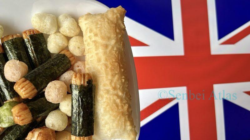 Arare (あられ) and Okaki (おかき) rice crackers on a plate with the Union Jack in the background.