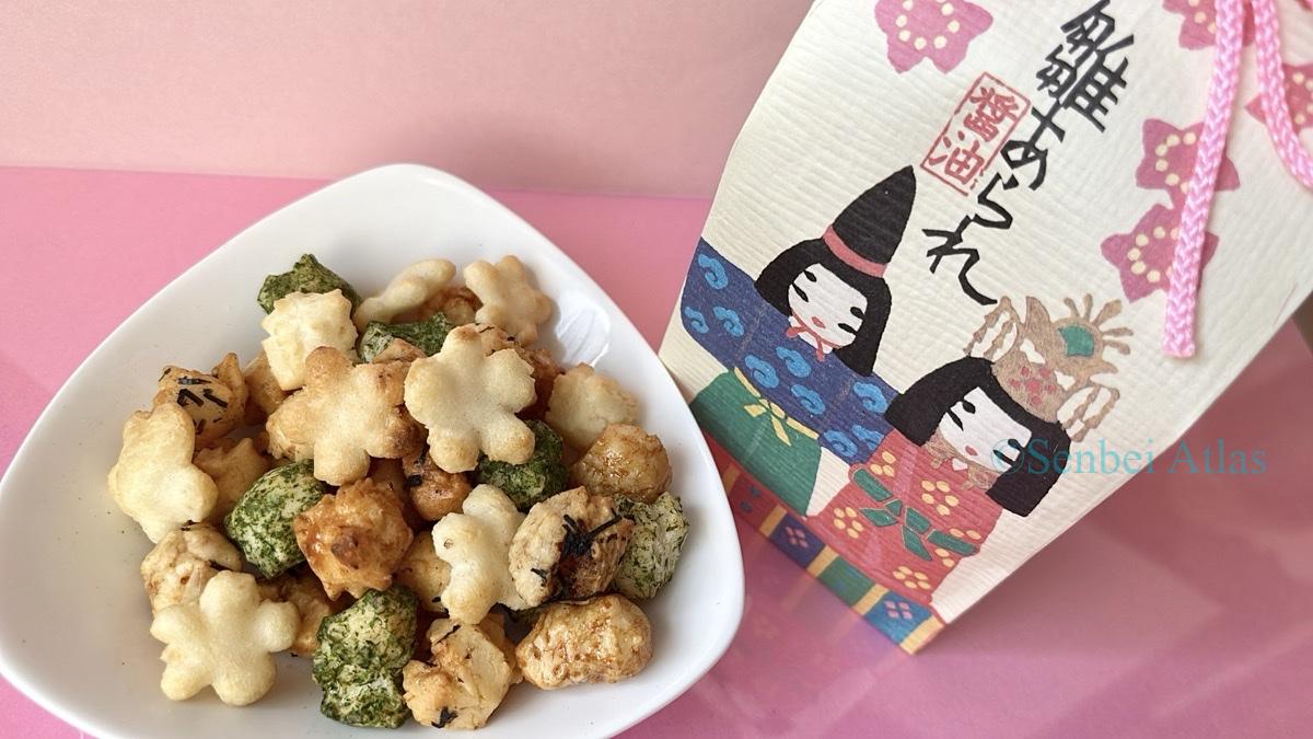 Savory snacks from the Ginza Akebono (銀座あけぼの) Hina-arare (ひなあられ) assortment served on a plate.