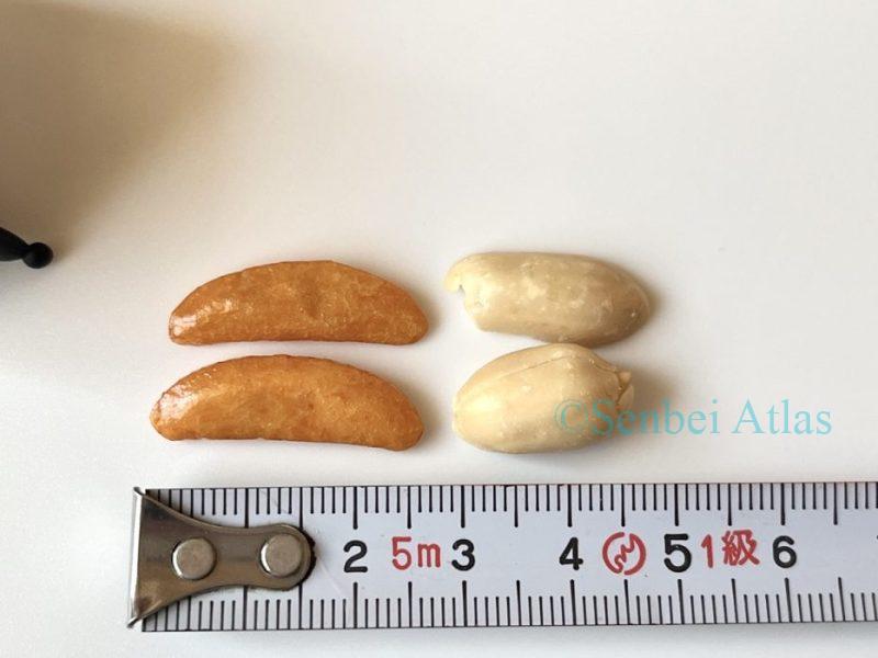 Kaki-no-Tane (柿の種) and Peanuts being measured with a Tape Measure for size comparison.