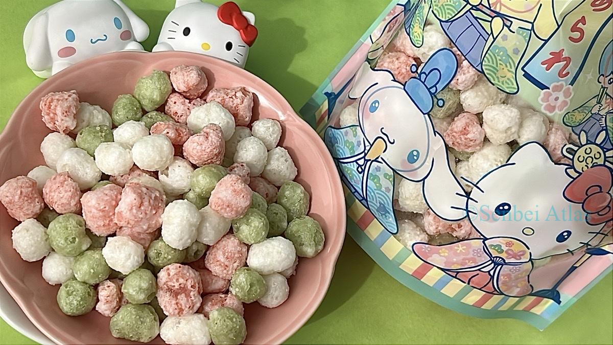 Kinchaku Sanrio Characters Hina-arare (巾着サンリオキャラクターズ ひなあられ) with colorful puffs on a plate, featuring Hello Kitty and Cinnamoroll figures.