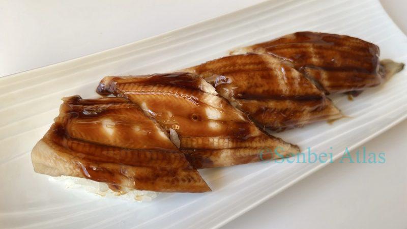 Anago (アナゴ) Nigiri Sushi served on a plate.