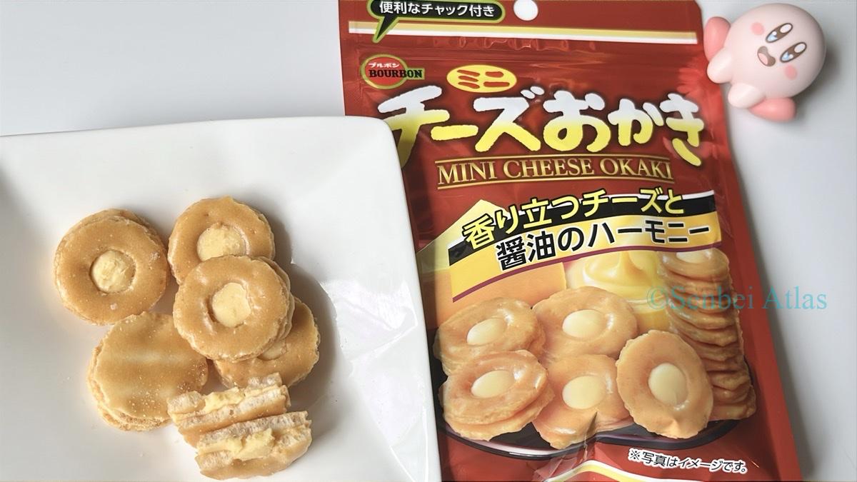 The package of Cheese Okaki (チーズおかき) and the contents, including a cross-section, on a plate with Kirby (カービー)