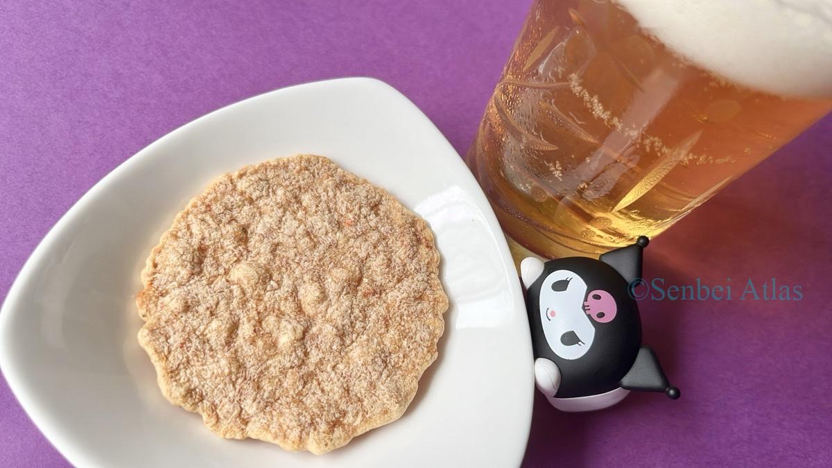 Yukari (ゆかり) cracker and a glass of beer with a Kuromi (クロミ) figure